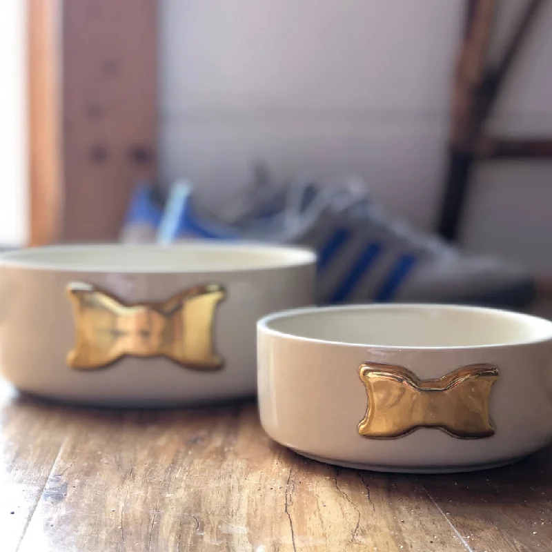 - Remote interactive pet feederGolden Dog Bowls
